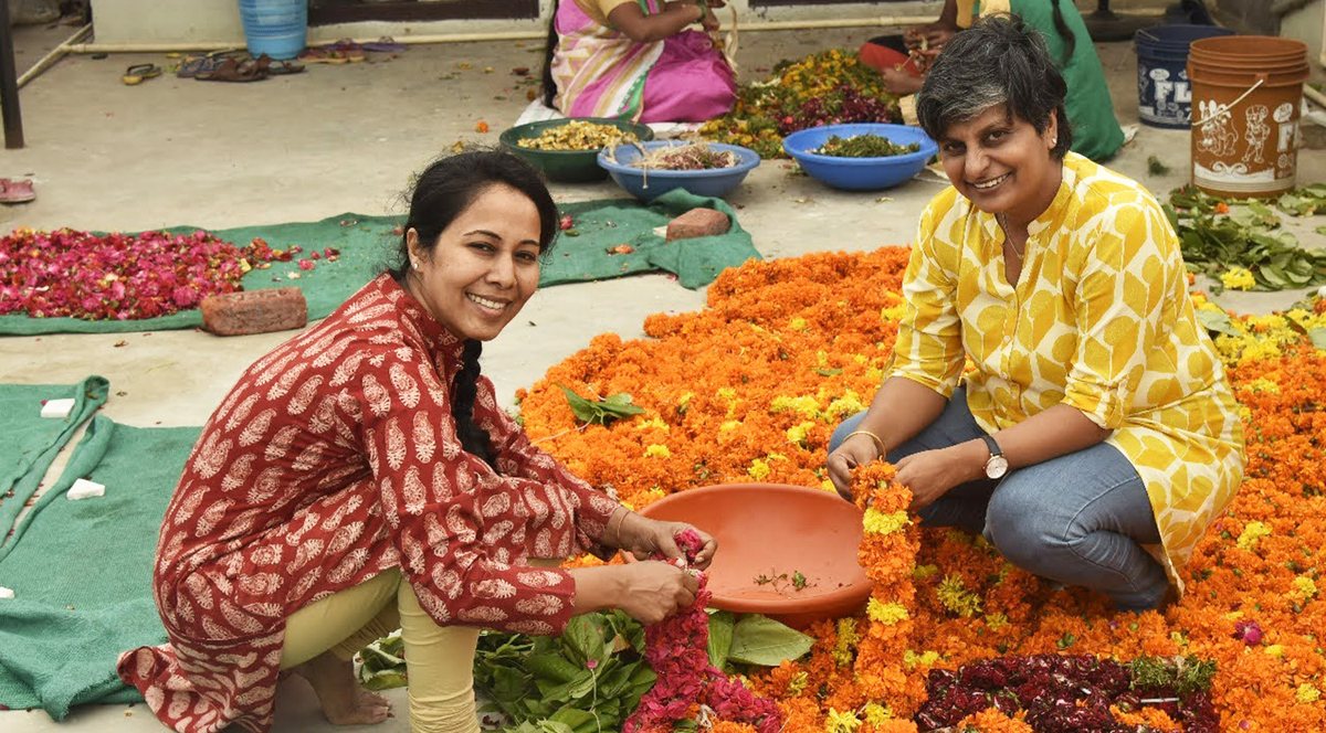 Phool Flowercyclers sorting temple flowers for recycling in Kanpur, India